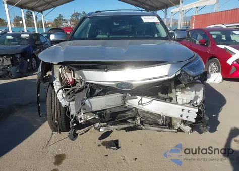 2021 Toyota Highlander Hybrid Xle from USA, damaged, VIN 5TDHBRCHXMS523418